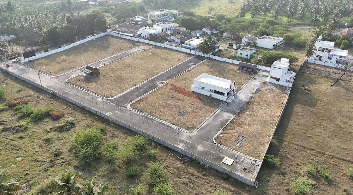 Aerial view of a developed plot layout with boundary and internal roads